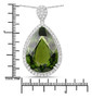 peridot and white diamond pear halo pendant necklace in solid 14k white gold shown for size comparison