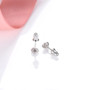 back view of ruby and white zircon stud earrings in rhodium over sterling silver