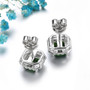 back view of chrome diopside and white zircon halo stud earrings in rhodium over sterling silver