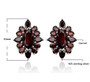 black garnet halo earrings in rhodium over sterling silver