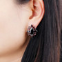 black garnet halo earrings in rhodium over sterling silver