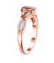 side view of pink tourmaline and moissanite ring in 18k rose gold and rhodium over sterling silver