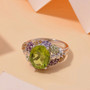 peridot multi gemstone flower ring in rhodium over sterling silver shown in a lifestyle photo