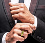 peridot and zircon gents ring in 18k yellow gold over sterling silver worn on a hand