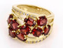 front view of garnet and white zircon openwork cluster ring in 18k yellow gold over sterling silver