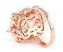 back view of rose quartz and lab sapphire halo ring in 18k rose gold over sterling silver