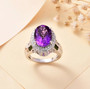 amethyst chrome diopside and white zircon ring in rhodium over sterling silver shown in a lifestyle photo