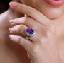 amethyst chrome diopside and white zircon ring in rhodium over sterling silver worn on a hand