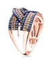 side view of champagne and blue diamond crossover ring in 18k rose gold over sterling silver