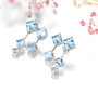 sky blue topaz earrings in rhodium over sterling silver