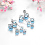 close up of sky blue topaz earrings in rhodium over sterling silver
