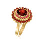 side view of garnet pink sapphire and yellow sapphire halo cluster ring in 14k yellow gold