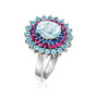side view of aquamarine sapphire swiss blue topaz and rhodolite garnet cluster halo ring in 14k white gold