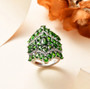 tanzanite and white zircon cluster ring in rhodium over sterling silver shown in a lifestyle photo