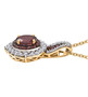 side view of garnet and white zircon pendant necklace in 18k yellow gold over sterling silver