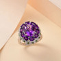 amethyst moissanite and chrome diopside ring in rhodium over sterling silver shown in a lifestyle photo