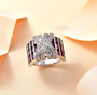 amethyst and white zircon cluster band ring in rhodium over sterling silver shown in a lifestyle photo
