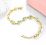 sky blue topaz and white zircon bracelet in 18k yellow gold over sterling silver