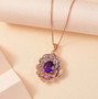 amethyst pink sapphire and zircon flower pendant necklace in 18k rose gold over sterling silver shown in a lifestyle photo
