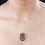 multi color diamond cluster pendant necklace in rhodium over sterling silver worn around the neck