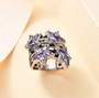 tanzanite and black spinel star ring in rhodium over sterling silver shown in a lifestyle photo