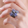 tanzanite and black spinel star ring in rhodium over sterling silver worn on a hand