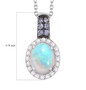 opal tanzanite and zircon halo pendant necklace in rhodium over sterling silver shown for size comparison