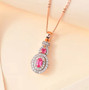 mahenge pink spinel and white zircon halo pendant necklace in 18k rose gold over sterling silver shown in a lifestyle photo