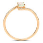 side view of ethiopian opal and diamond bypass ring in solid 14k yellow gold
