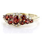 front view of garnet and diamond cluster ring in 14k yellow gold
