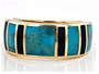close up of purple turquoise and black onyx inlay band ring in 18k yellow gold over sterling silver