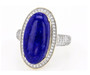 front view of lapis lazuli and white zircon halo ring in 10k yellow gold
