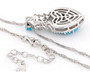 back view of turquoise and zircon cluster pendant necklace in rhodium over sterling silver