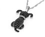 side view of black spinel and white zircon dog pendant necklace in rhodium over sterling silver