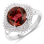 rubellite tourmaline and diamond halo ring in solid 14k white gold