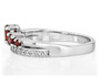 side view of garnet and white zircon ring in rhodium over sterling silver