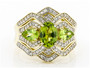 peridot and diamond wideband three stone ring in 14k yellow gold