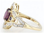 side view of rhodolite garnet tanzanite and diamond ring in 14k yellow gold