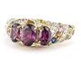 angled view of rhodolite garnet multi sapphire and diamond ring in 14k yellow gold