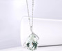 close up of prasiolite and white zircon pendant necklace in rhodium over sterling silver