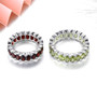 full view of oval garnet bezel set eternity band ring in rhodium over sterling silver