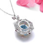 back view of sky blue topaz citrine rhodolite garnet and zircon pendant necklace in 18k yellow gold and rhodium over sterling silver