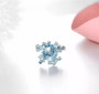 close up of sky blue topaz brooch in rhodium over sterling silver