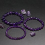 round natural amethyst beaded stretch bracelet 6 8 or 10mm shown in a lifestyle photo