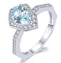 pear sky blue topaz and white zircon halo ring in rhodium over sterling silver