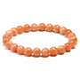 full view of round natural peach moonstone beaded stretch bracelet 6 8 or 10mm