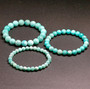 round natural amazonite beaded stretch bracelet 6 8 or 10mm shown in a lifestyle photo