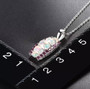 ethiopian opal and rhodolite garnet pendant necklace in rhodium over sterling silver
