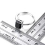emerald cut black spinel solitaire ring in rhodium over sterling silver shown for size comparison