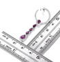 rhodolite garnet and white zircon earrings in rhodium over sterling silver shown for size comparison